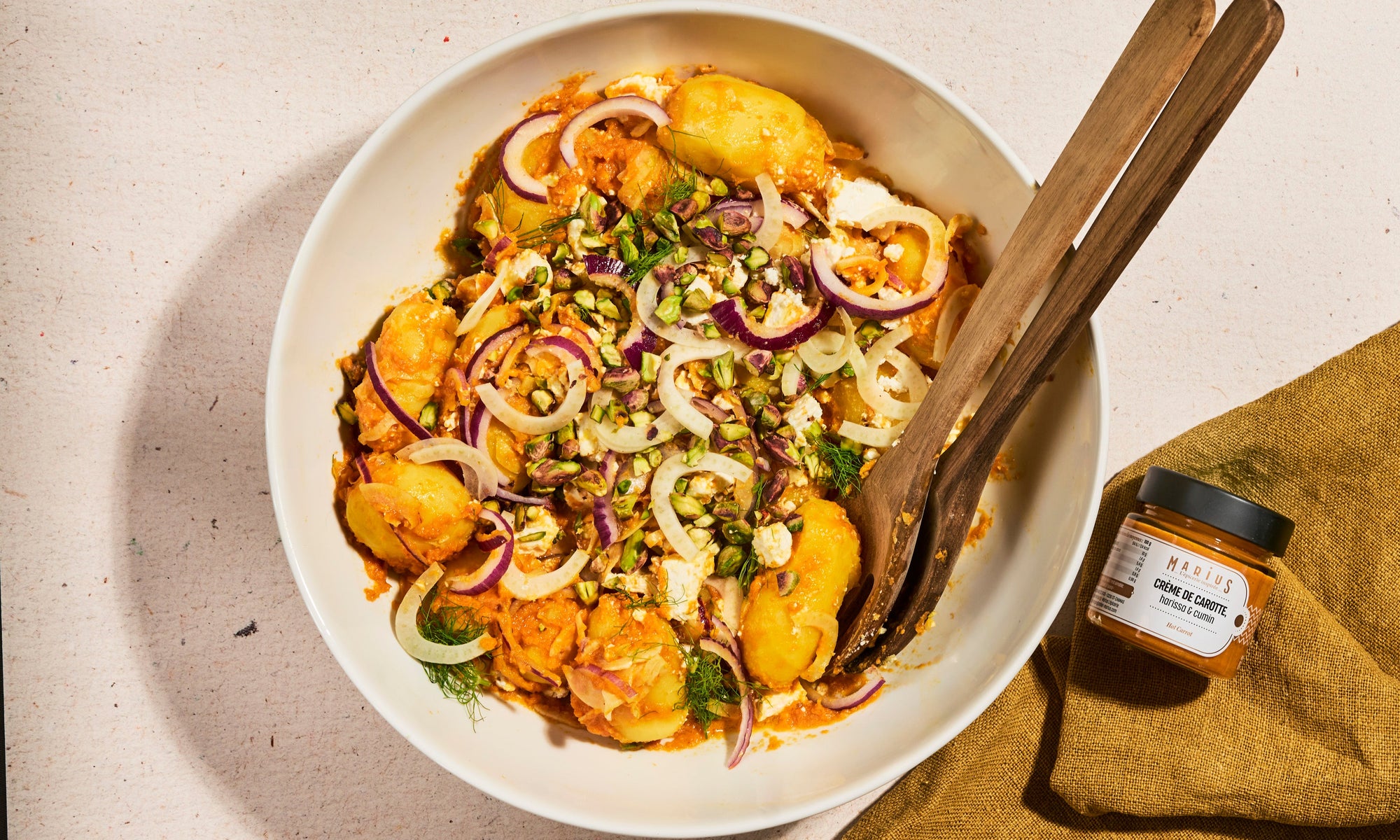 Salade de pommes de terre à la crème de carotte, cumin & feta