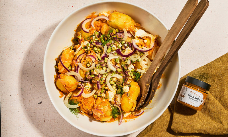 Salade de pommes de terre à la crème de carotte, cumin & feta
