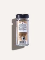 Flacon d'ail semoule MARiUS 70 g, vue de dos sur fond beige